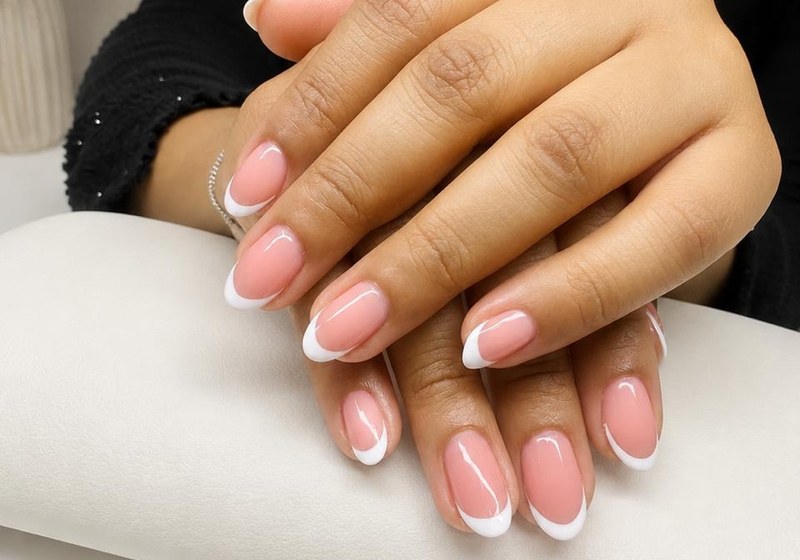 Elegant light French manicure at Serene Suite